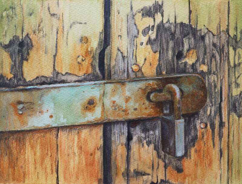 Rusty lock and latch on old paint peeled door.