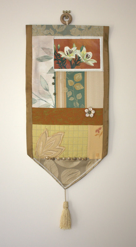 Wall hanging, textiles, painting and found objects